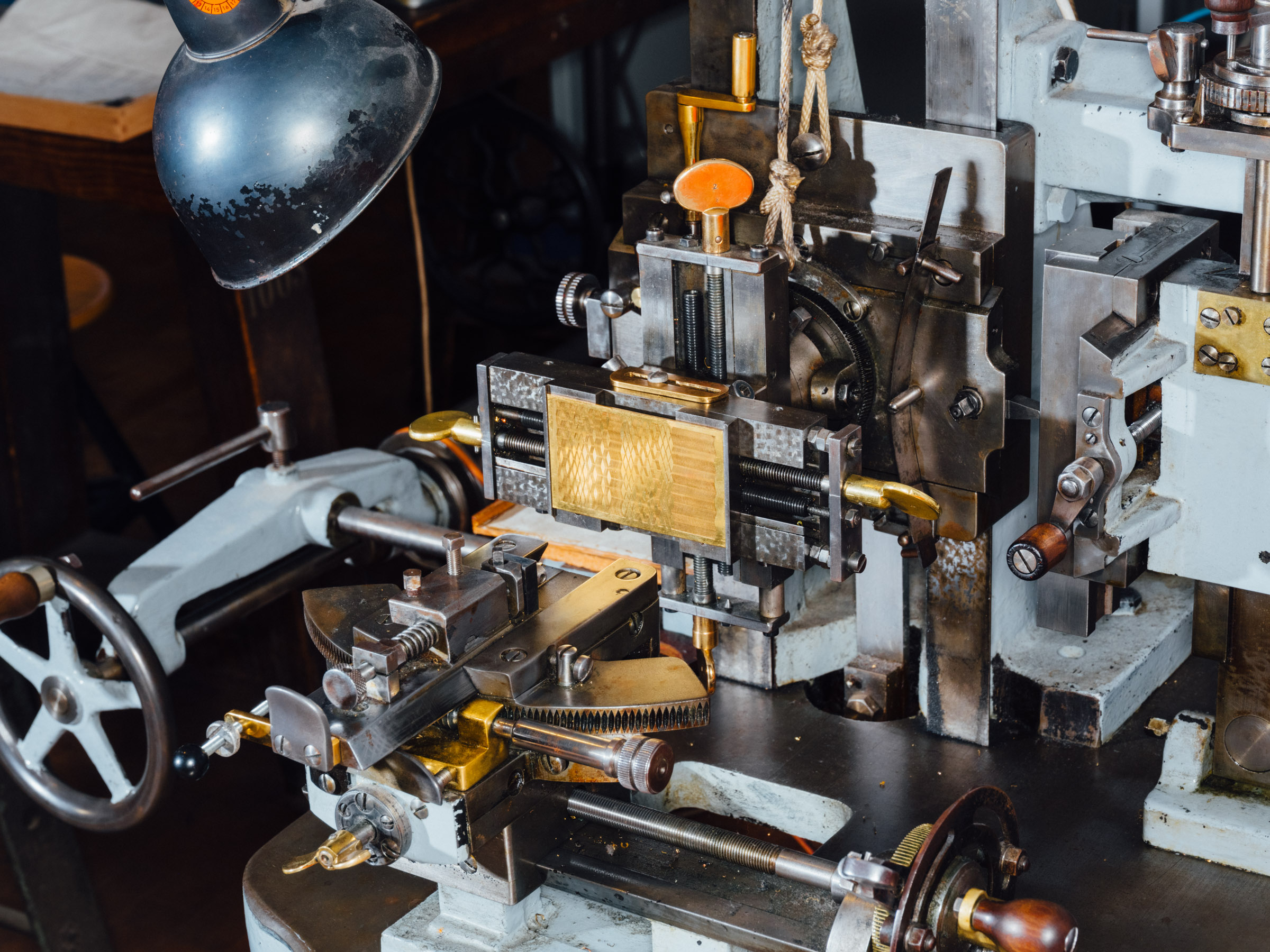 Close-up of the guilloché machine. It is used to engrave geometric patterns into pieces of metal. 